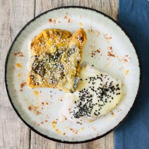 Merluza al curry con budín de calabaza y berenjena